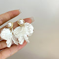 Fashion Unique Glossy Shell Flower Pendant Earrings for Women Temperament Pearl Earrings Sweet Design Wedding Gifts